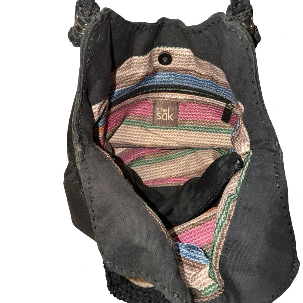 The Sak Indio black leather hobo bag, braided shoulder straps